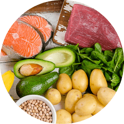 An image showcasing a variety of Vitamin B-6 rich foods such as bananas, chickpeas, and poultry, representing the nutrient-dense components that inspire the formulation of Revvl Sleep.